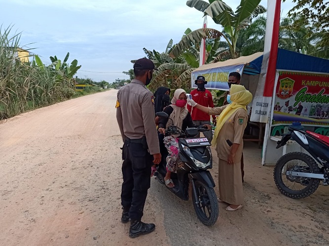 Polsek Bangko Pusako Laksanakan Giat siaga Jaga Kampung dan Sosialidasi Kebiasaan Baru