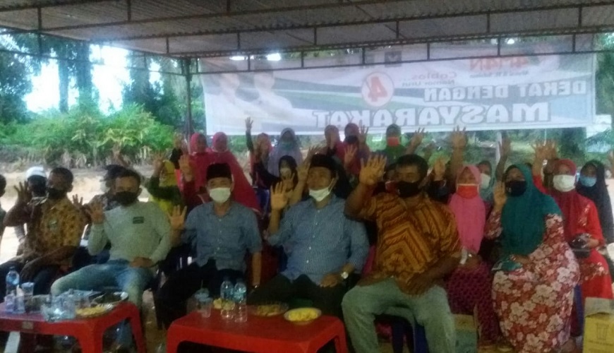 Walaupun Cuaca Hujan, Calon Bupati Rohil Afrizal Sintong dan H. Sulaiman Jargon AMAN Berkampanye Dialogis di Ampean Rotan