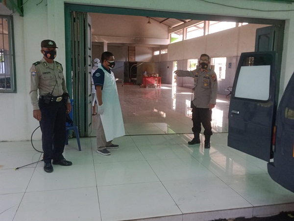 Kompol Pahotan Manurung, SH Kawal Pengkremasan Warga Terkonfirmasi Positif Covid-19