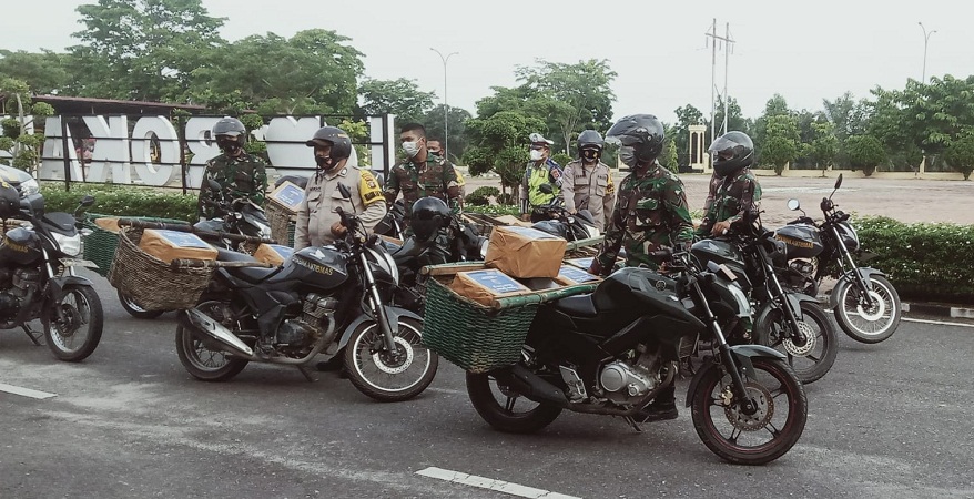 Polres Rokan Hilir menggelar kegiatan Bantuan Sosial PPKM Darurat