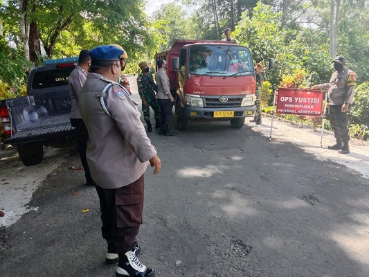 Satgas Yonarhanud 11/WBY Menggelar Operasi Yustisi dan Bagikan Masker Gratis